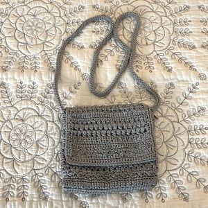 The Sak gray with silver metallic threads crossbody. 7”x6”.